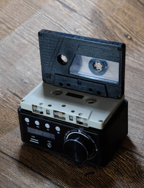 istock Audio cassette next to the amplifier on the table 1370960088