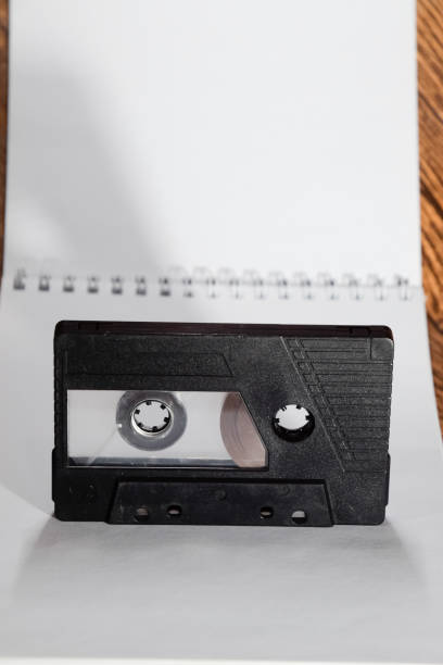 istock Audio cassette. Retro music medium, compact cassette tape recorder. 1370960107