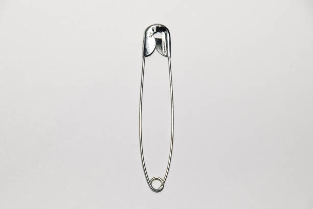 istock Pin on white background. pin for fastening clothes. 1370962499