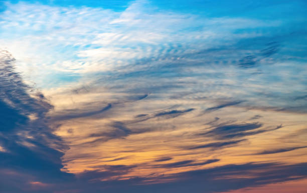 istock blue sky with spindrift clouds at sunset 1370966506