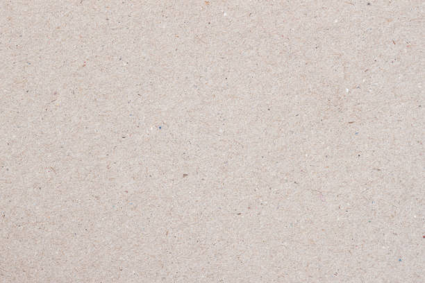 istock Natural craft paper texture, light grey cardboard background close-up 1370966626
