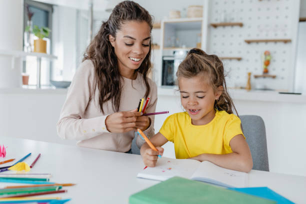 istock Caring mother study for school with her daughter 1370967791