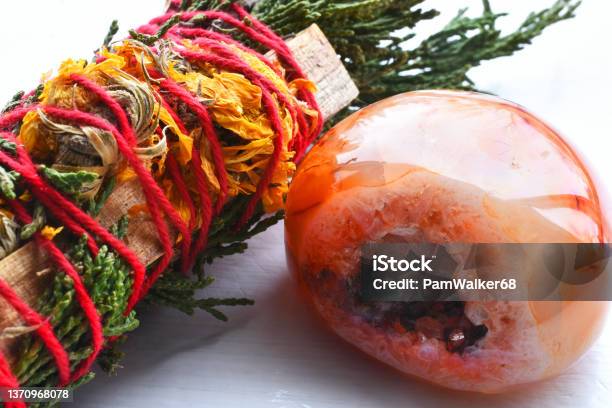 Healing Smudge Stick And Carnelian Geode Close Up Stock Photo - Download Image Now - Alternative Medicine, Alternative Therapy, American Culture