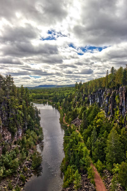 istock Clouds gather above the zip line running between the Canyon - Thunder Bay, Ontario, Canada 1370968142