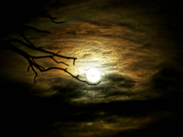 istock The Moon in the middle of the clouds 1370969416
