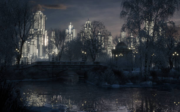 Krakow, Poland - November 30th 2023:  A snowy park scene in Krakow captures the charm of winter, with walkers enjoying a peaceful stroll. Tall trees, snow-covered paths, and an atmosphere of calm create a serene urban escape.