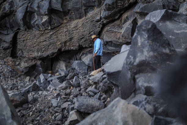 istock a man in a volcanic stone quarry 1370974269