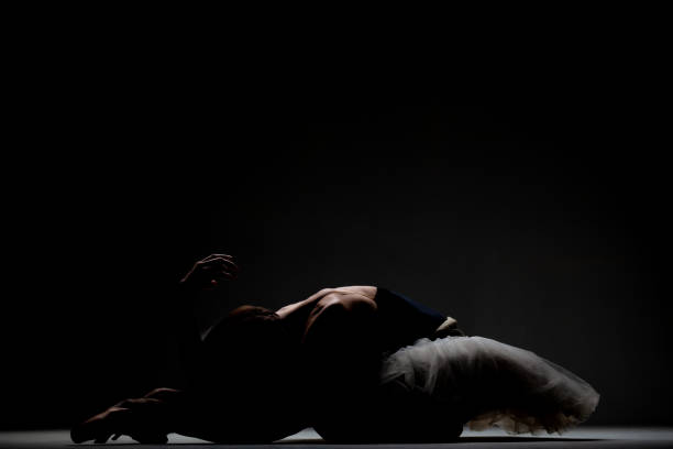 istock ballerina with a tutu posing on the floor 1370979062