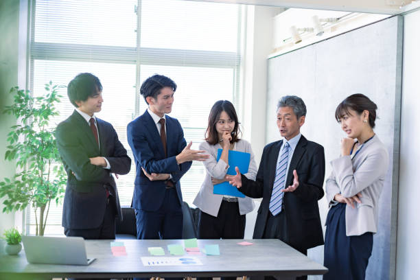 istock Businesspeople having a discussion in the office 1370981723