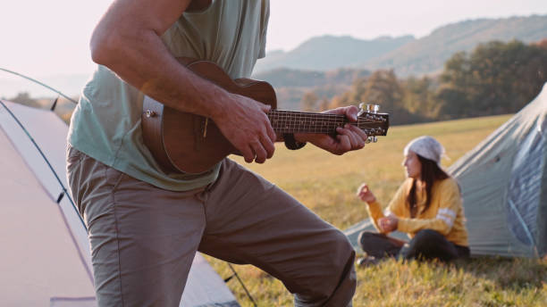 istock Camping in nature at sunset with tent. Autumn. 1370984064