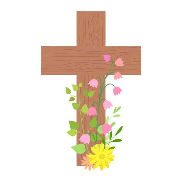 istock Wooden cross decorated with green branches and flowers 1370984292
