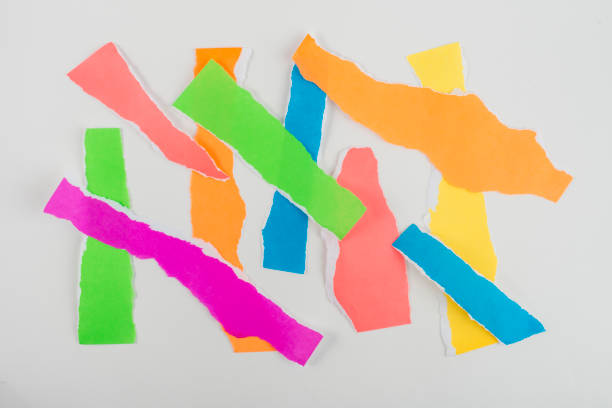 istock Neon colour torn paper strips isolated on white background. 1370984343