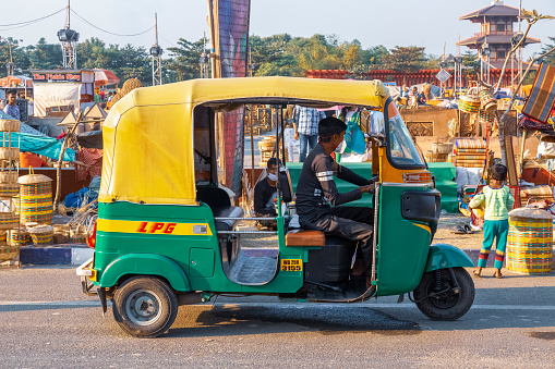 Auto rickshaw waiting for passengers near a handicraft fair at Rajarhat area Kolkata India, dated January 18,2022.