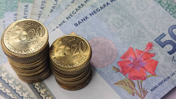 Malaysia ringgit currency coin and 50 ringgit Malaysia currency knot close up photo coins of ringgit of malaysia stock pictures, royalty-free photos & images