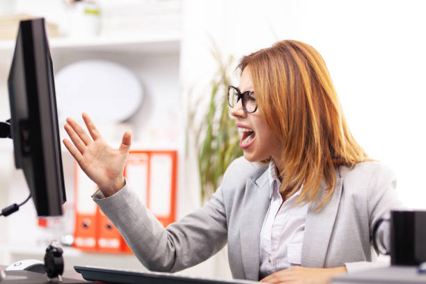 istock angry business woman in an office 1370993640