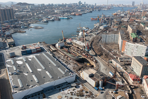 Vladivostok, Russia - February 5, 2022:A top view of the repair dock with the ship. And part of the sea bay.