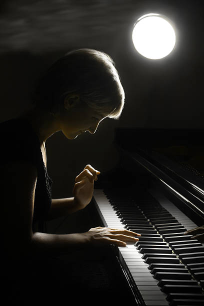 istock Piano pianist musician playing classical music. 137100227