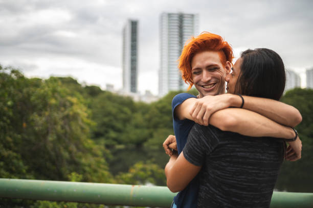 Gay couple dating outdoors on a cloudy day in Recife, Pernambuco, Brazil