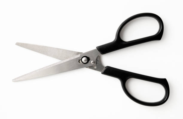 istock Isolated shot of opened black handle scissors on white background 1371015647