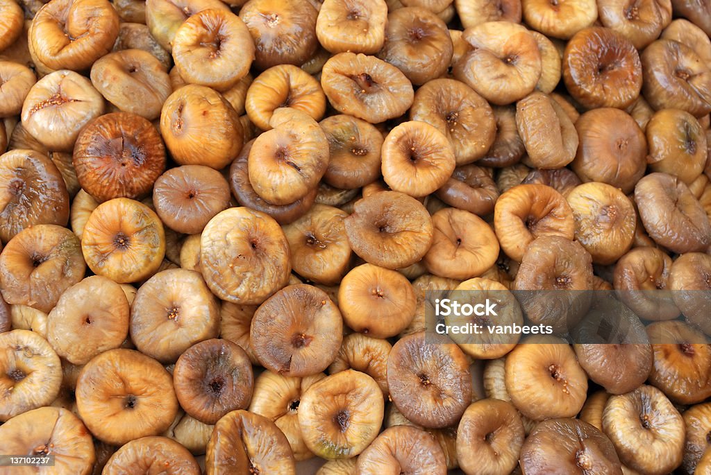 Dried figs for sale on a market in Morocco Dried figs for sale on a market in Morocco.Can be used as background Brown Stock Photo