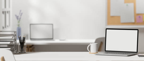 istock Modern office studio interior with portable laptop mockup and copy space on table 1371024031