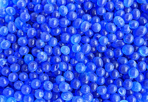 Pila de gel de sílice azul. fondo de textura de gel de sílice azul. photo