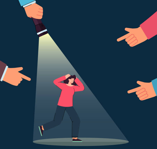 istock Fingers pointing at scared woman in light of flashlight 1371030435