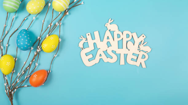 istock happy easter background greeting card concept text with decorated flat easter eggs on a blue 1371033304