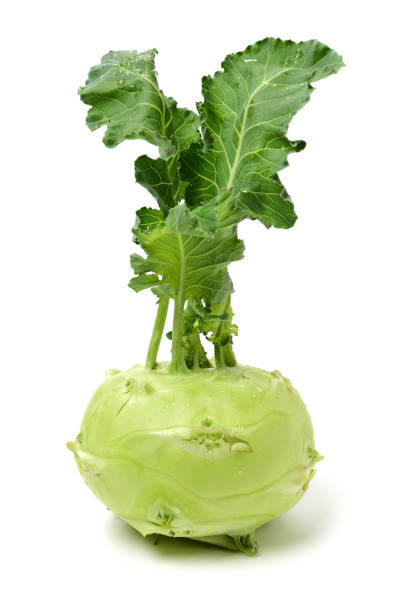 istock Fresh kohlrabi with green leaves 1371034172