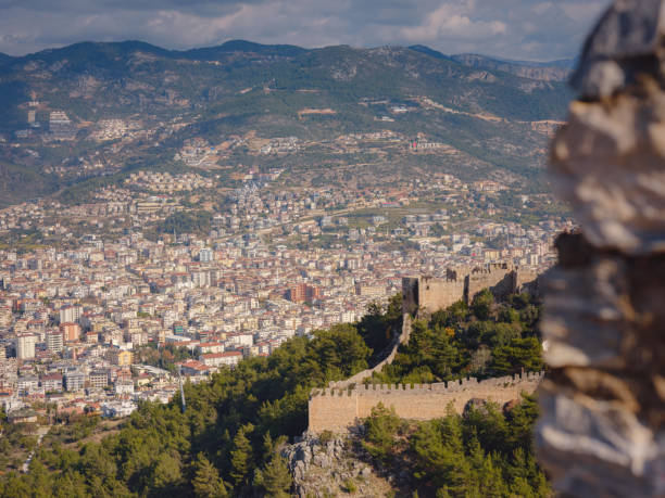 istock Alanya, turkey, winter walk by mediterranean sea 1371034326