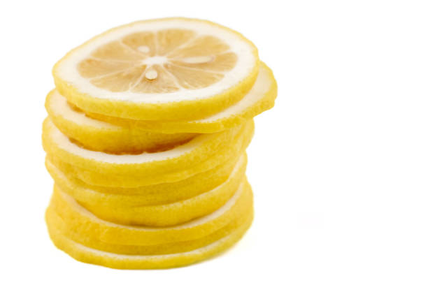 Fresh yellow lemons cut into pieces are beneficial to the body.