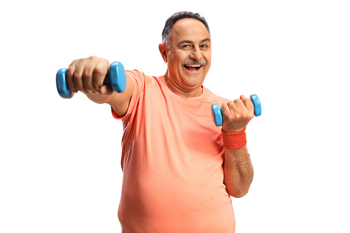 Cheerful mature man exercising with dumbbells isolated on white background