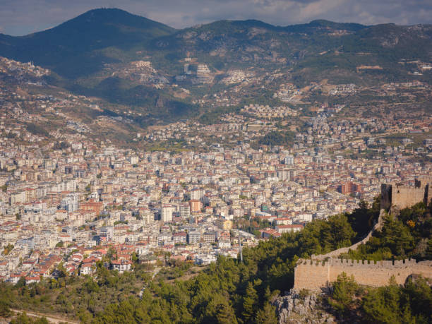 istock Alanya, turkey, winter walk by mediterranean sea 1371041962