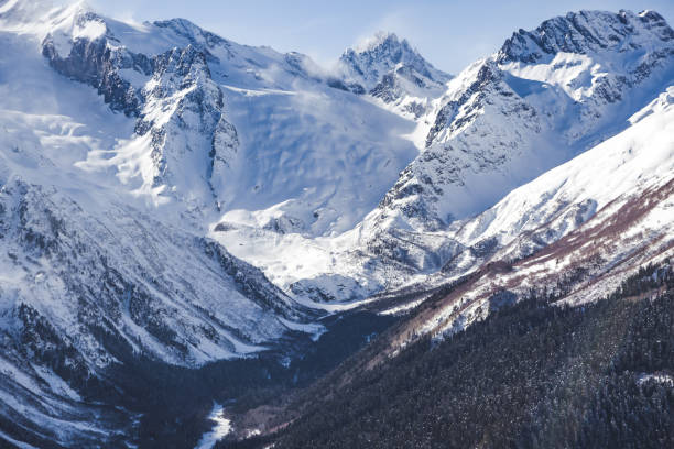 istock mountain gorge and high cliffs in the snow Dombay 1371044321