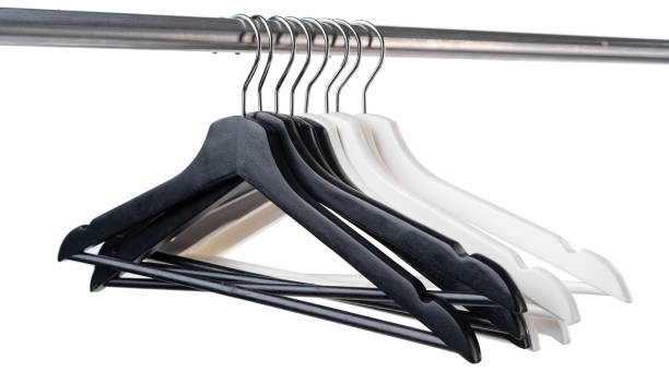 istock Metal rack with clothes hangers on white background 1371047682