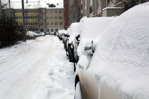 istock Cars parked under white snow in winter 1371048282