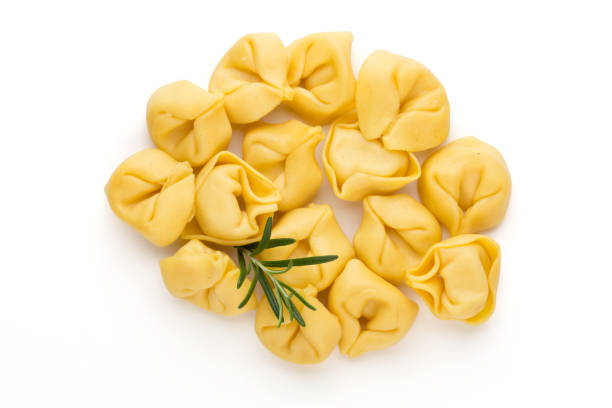 istock Raw homemade pasta,tortellini with herbs. 1371049617