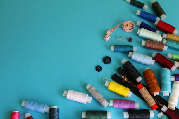 istock A lot of spools of threads scattered on the table 1371049849