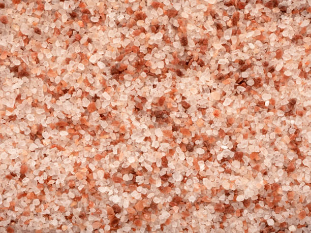 Rock himalayan salt Full frame view of rock himalayan salt bath salt stock pictures, royalty-free photos & images