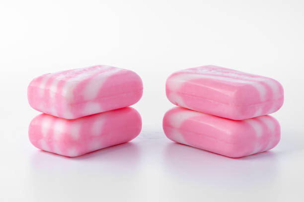 istock Pieces of pink soap isolated on white background 1371052902