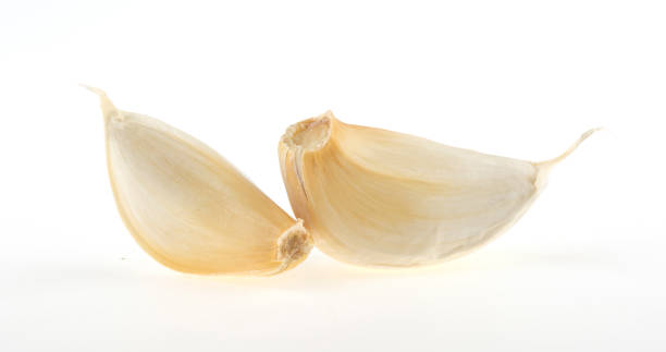 istock garlic cloves isolated on white background 1371054115