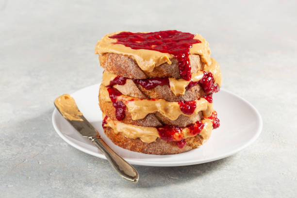 istock peanut butter and jam sandwich, american traditional bread toast 1371054834