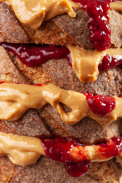 istock peanut butter and jam sandwich, american traditional bread toast 1371054862