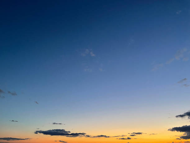 istock Sunset on blue sky. Blue sky with some clouds. Beautiful sunset. 1371057613