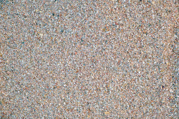 istock Flat view of clean yellow sand surface covering seaside beach. Sandy texture 1371060006