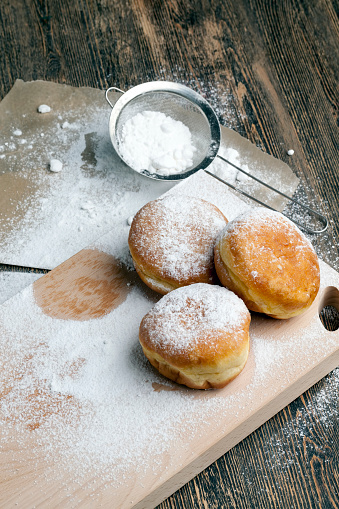 fried in oil Berlin donuts with stuffing, dessert of delicious and sweet donuts with stuffing