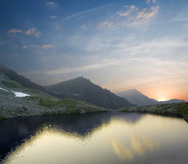 istock coast of mountain lake 1371061093
