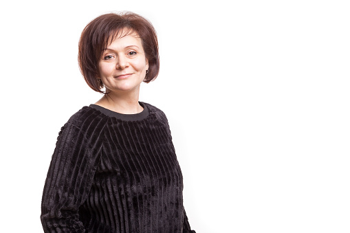 Natural Portrait of Positive Brunette Mature Confident Caucasian Business Woman in Black Striped Jumper Posing Over White Background.Horizontal Image