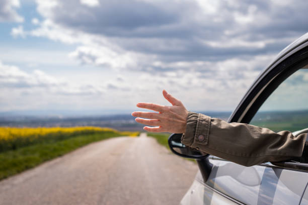 istock Woman enjoying road trip 1371065124