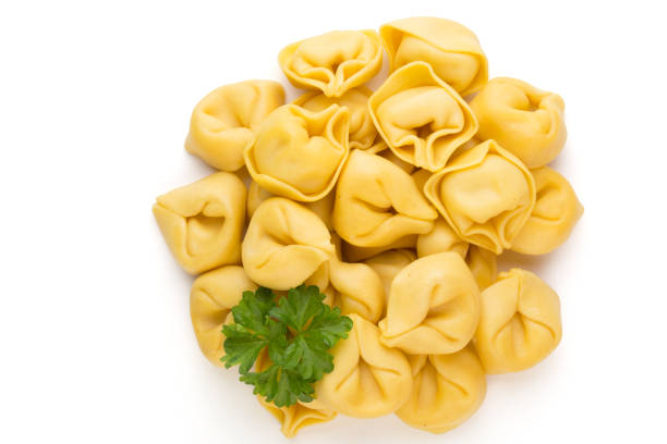 istock Raw homemade pasta,tortellini with herbs. 1371067693
